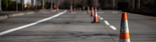 caution cones in the middle of a road